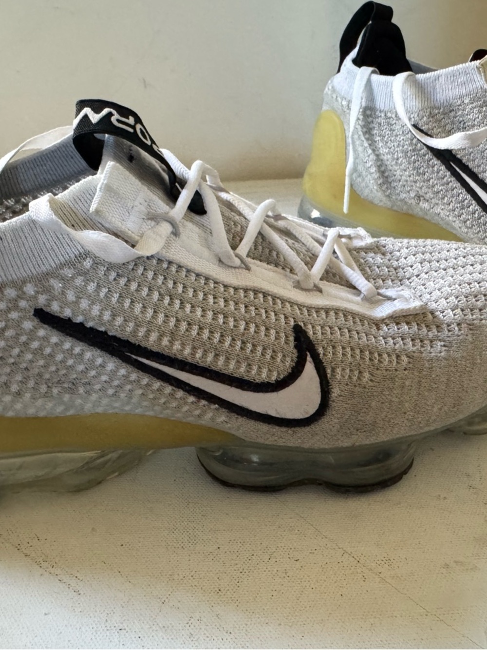 Nike White and Yellow Air VaporMax Flyknit Sneakers with Black Swoosh
